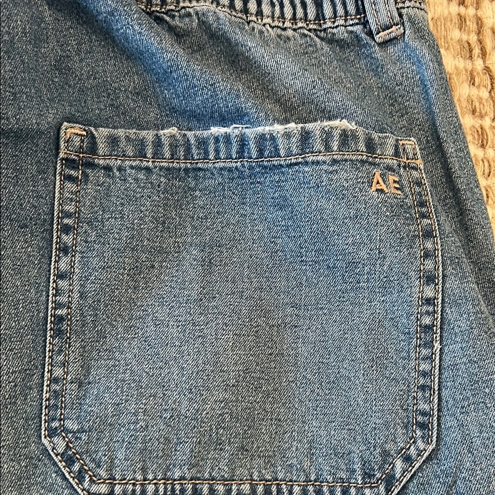 American Eagle Outfitters Blue Cropped Cargo Jeans with Pink Drawstring Accent - Picture 6 of 10